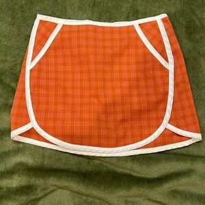 Urban outfitters size medium orange, pink plaid, mini skirt, 2 front pockets